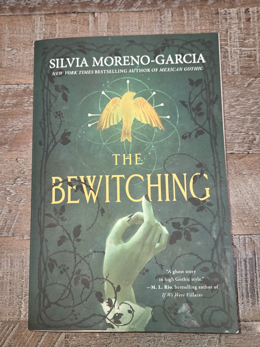 The Bewitching by - Green Book Cover